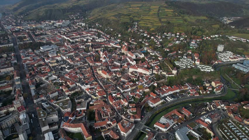 Aerial panoramic view around the old town city Krems an der Donau in Austria on a sunny autumn morning day