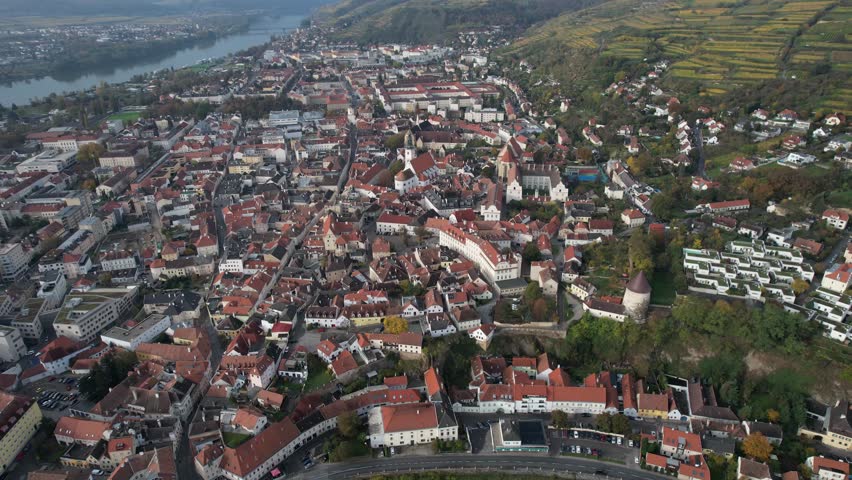 Aerial panoramic view around the old town city Krems an der Donau in Austria on a sunny autumn morning day