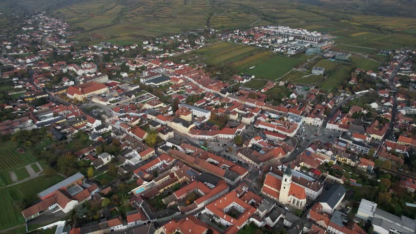 Aerial panoramic view around the old town city Langenlois in Austria on a sunny autumn morning day