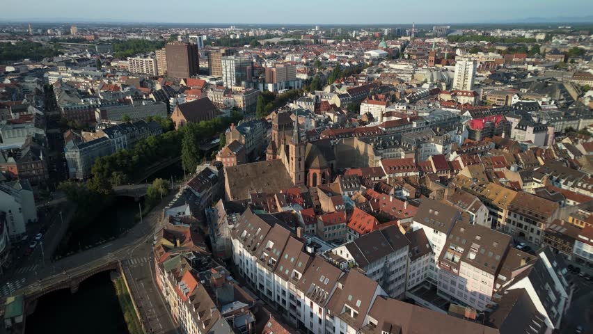 Aerial view of Strasbourg, capturing the blend of historic and modern architecture along the River Ill