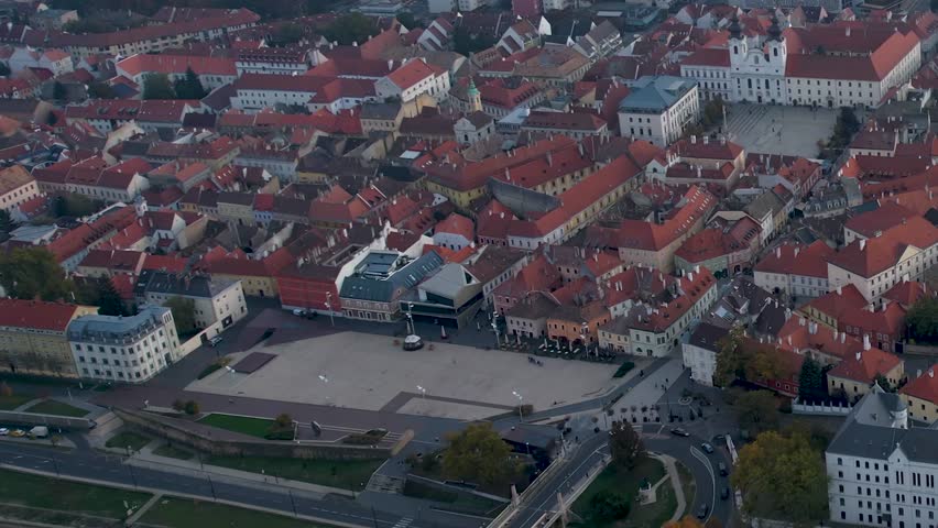 Aerial wide view around the city Győr in Hungary on a cloudy autumn day.
