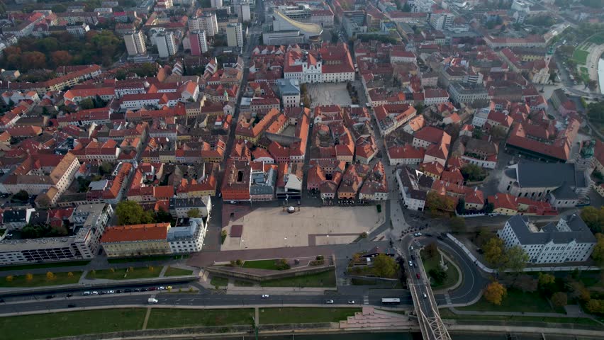 Aerial wide view around the city Győr in Hungary on a cloudy autumn day.