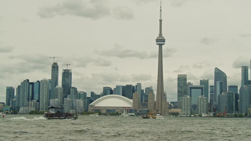 Downtown Toronto Skyline With CN Tower Overlooking Lake Ontario Waterfront Boats Modern Architecture And Urban Landscape Showcasing Travel Tourism And Canadian City Identity