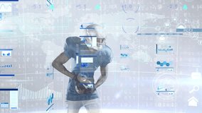 Animation of statistical data processing over african american male rugby player throwing rugby ball. Sports and business technology concept - Powered by Shutterstock - Get 15% off with code: PIKWIZARD15