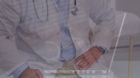 Animation of data processing over caucasian male doctor smiling. Global medicine and digital interface concept digitally generated video. - Powered by Shutterstock - Get 15% off with code: PIKWIZARD15