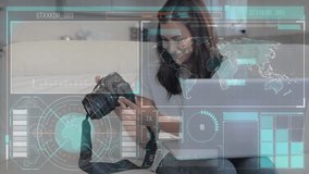 Animation of data processing over caucasian woman with camera. Global business and digital interface concept digitally generated video. - Powered by Shutterstock - Get 15% off with code: PIKWIZARD15