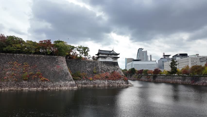 Osaka Castle Surrounded by Moat and Autumn Foliage