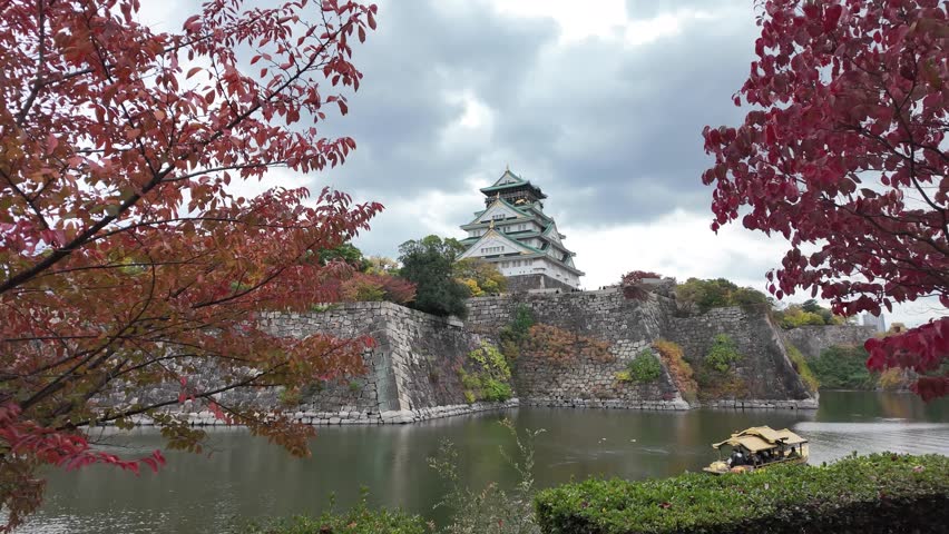 Osaka Castle Surrounded by Moat and Autumn Foliage