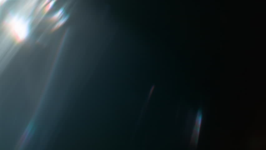 Real Shooted Cinematic Lens Flare Overlay on Black Background at 1000fps Slow Motion.