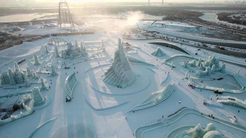 This 4K aerial time-lapse video showcases Harbin’s unique urban charm, featuring modern CBD architecture, grand bridges, historic Saint Sophia Cathedral, Grand Theatre and the magical Ice-Snow World. It captures the perfect blend of historic cultural landmarks and stunning winter ice-snow scenery in northern China’s iconic ice city, ideal for tourism promotion and winter city content.