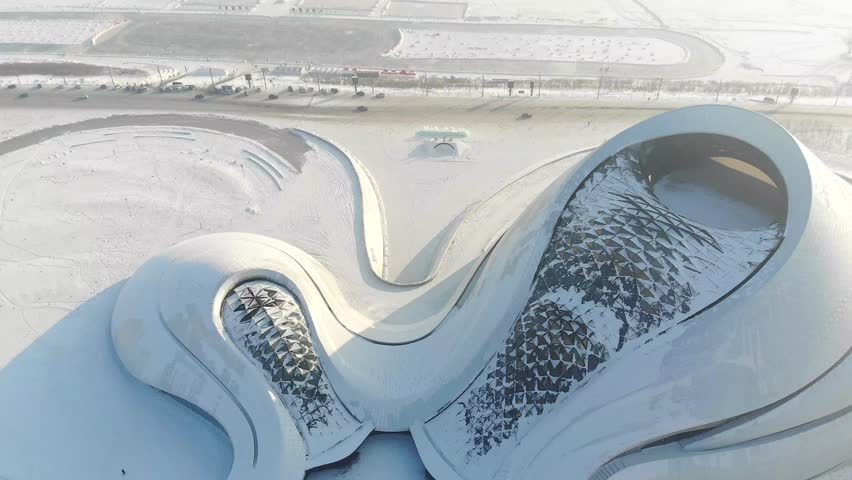 This 4K aerial time-lapse video showcases Harbin’s unique urban charm, featuring modern CBD architecture, grand bridges, historic Saint Sophia Cathedral, Grand Theatre and the magical Ice-Snow World. It captures the perfect blend of historic cultural landmarks and stunning winter ice-snow scenery in northern China’s iconic ice city, ideal for tourism promotion and winter city content.