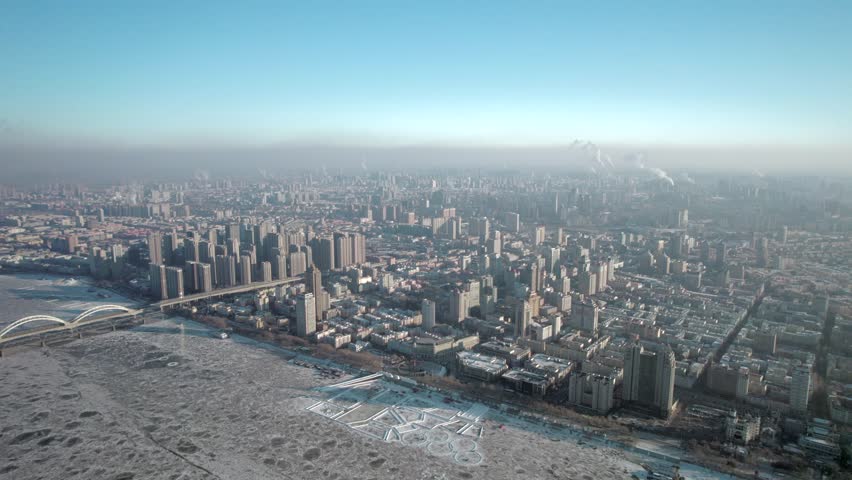 This 4K aerial time-lapse video showcases Harbin’s unique urban charm, featuring modern CBD architecture, grand bridges, historic Saint Sophia Cathedral, Grand Theatre and the magical Ice-Snow World. It captures the perfect blend of historic cultural landmarks and stunning winter ice-snow scenery in northern China’s iconic ice city, ideal for tourism promotion and winter city content.