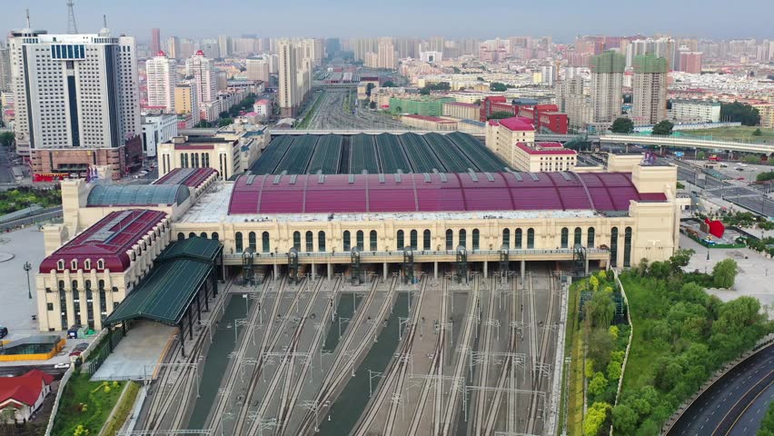 This 4K aerial time-lapse video presents Harbin’s distinctive charm, blending modern CBD architecture, historic Saint Sophia Cathedral, Grand Theatre, magical Ice-Snow World with grand bridges and smooth urban traffic flow. It captures the perfect fusion of cultural landmarks, winter ice-snow scenery and dynamic urban traffic in northern China’s iconic ice city, perfect for tourism promotion and winter urban content.