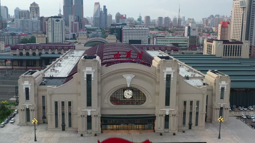 This 4K aerial time-lapse video presents Harbin’s distinctive charm, blending modern CBD architecture, historic Saint Sophia Cathedral, Grand Theatre, magical Ice-Snow World with grand bridges and smooth urban traffic flow. It captures the perfect fusion of cultural landmarks, winter ice-snow scenery and dynamic urban traffic in northern China’s iconic ice city, perfect for tourism promotion and winter urban content.