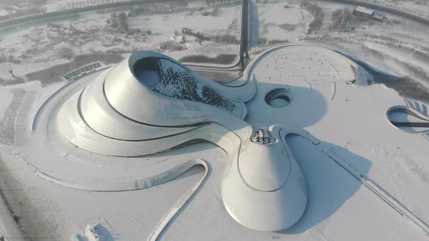 This 4K aerial time-lapse video presents Harbin’s distinctive charm, blending modern CBD architecture, historic Saint Sophia Cathedral, Grand Theatre, magical Ice-Snow World with grand bridges and smooth urban traffic flow. It captures the perfect fusion of cultural landmarks, winter ice-snow scenery and dynamic urban traffic in northern China’s iconic ice city, perfect for tourism promotion and winter urban content.