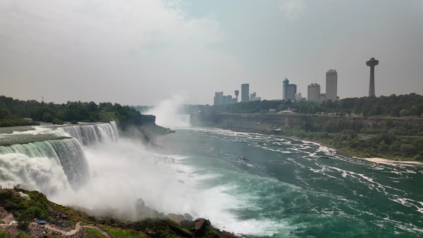 American falls at niagara falls with canadian skyline