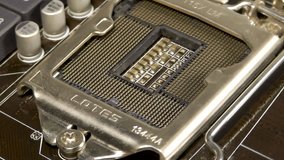 Electronic motherboard with an empty processor socket - Powered by Shutterstock - Get 15% off with code: PIKWIZARD15