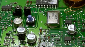 Electronic printed circuit board with microcircuits, transistors and SMD components - Powered by Shutterstock - Get 15% off with code: PIKWIZARD15