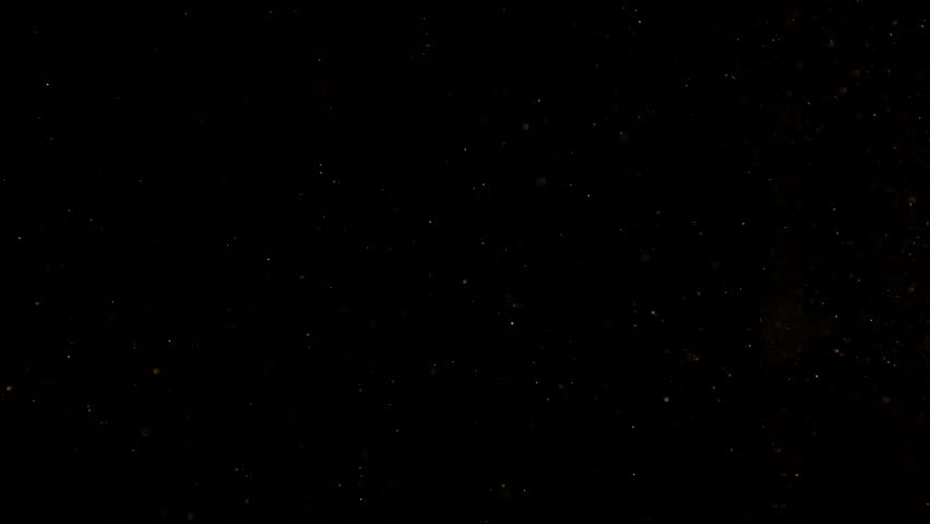 Super Slow Motion Shot of Golden Glitters on Black Background at 1000fps.