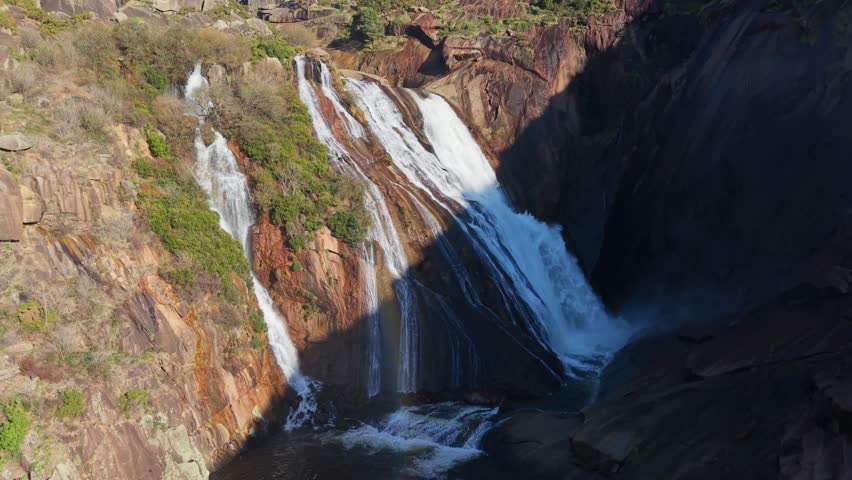 Cascades Over Rocky Mountain At Ezaro Waterfalls In Galicia, Spain. Aerial Shot