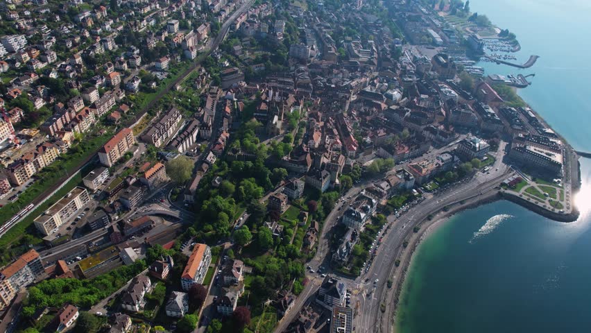 Panoramic aerial of the old town of the city Neuchâtel in Switzerland on a sunny noon in summer