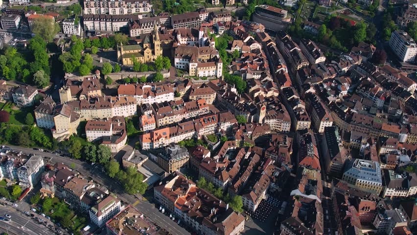 Panoramic aerial of the old town of the city Neuchâtel in Switzerland on a sunny noon in summer