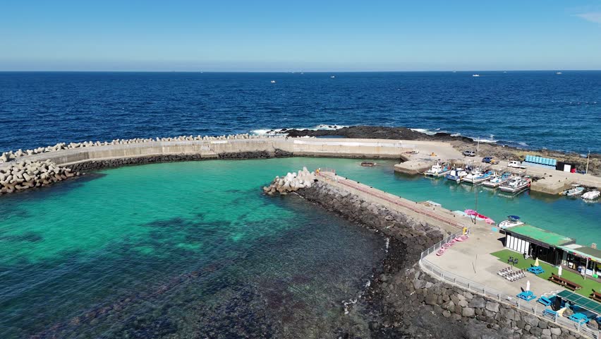 eautiful port in Jeju island, South Korea. stone salt field