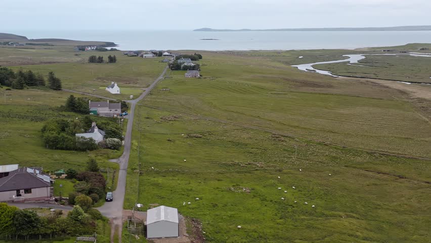 Drone shot of the villages of Gress and Back, with the Gress river and beach.