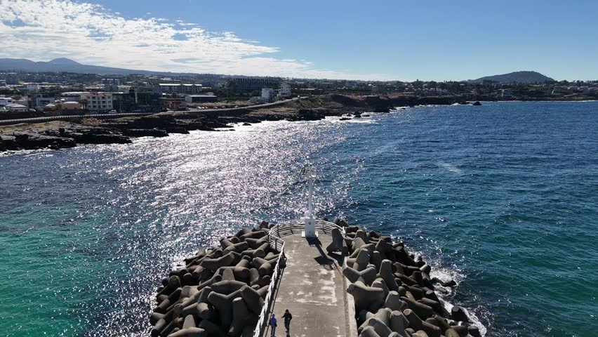 eautiful port in Jeju island, South Korea. stone salt field