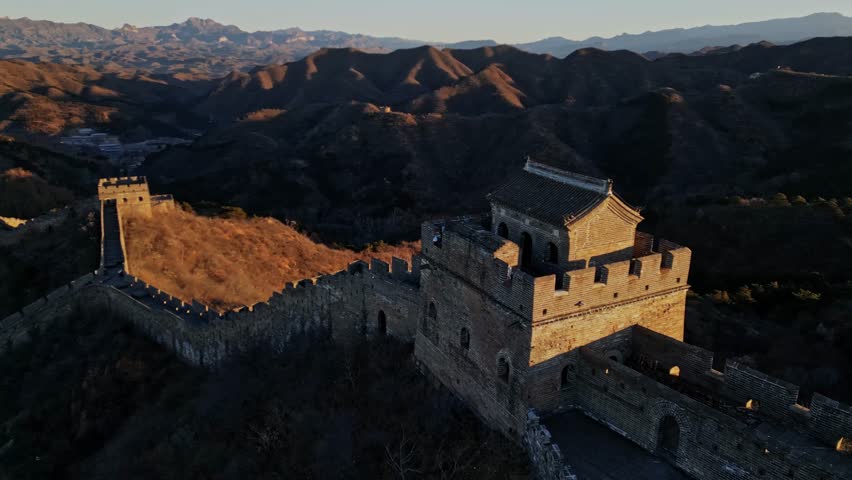 Aerial view of the Great Wall of China snaking its way through a mountainous landscape, Huairou District, Beijing, China.