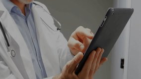 Doctor raising tablet, swiping touchscreen, activating candlestick charts, tracking health data. Technology, healthcare, data analysis, innovation, professional, modern, digital interface - Powered by Shutterstock - Get 15% off with code: PIKWIZARD15