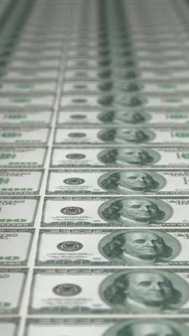 Paper money, hundred-dollar bills. Background of cash money. Vertical video.
