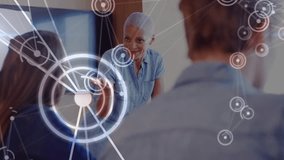 Animation of network of connections over diverse businesspeople in office. Business, cooperation, connections and technology concept digitally generated video. - Powered by Shutterstock - Get 15% off with code: PIKWIZARD15