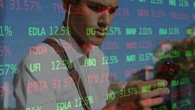 Animation of data processing over man using smartphone. Global business and digital interface concept digitally generated video. - Powered by Shutterstock - Get 15% off with code: PIKWIZARD15