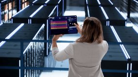 Female Using Cybersecurity Dashboard In Data Center For Investigating Online Attacks - Powered by Shutterstock - Get 15% off with code: PIKWIZARD15