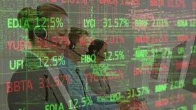 Animation of stock market data processing over team of customer care executive working at office. Global economy and business technology concept - Powered by Shutterstock - Get 15% off with code: PIKWIZARD15