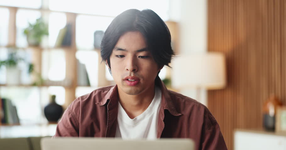 Man, headache and stress in home with laptop, job search struggle and financial crisis from unemployment. Frustrated, Asian person and migraine in apartment with computer, bad news and loss of work.