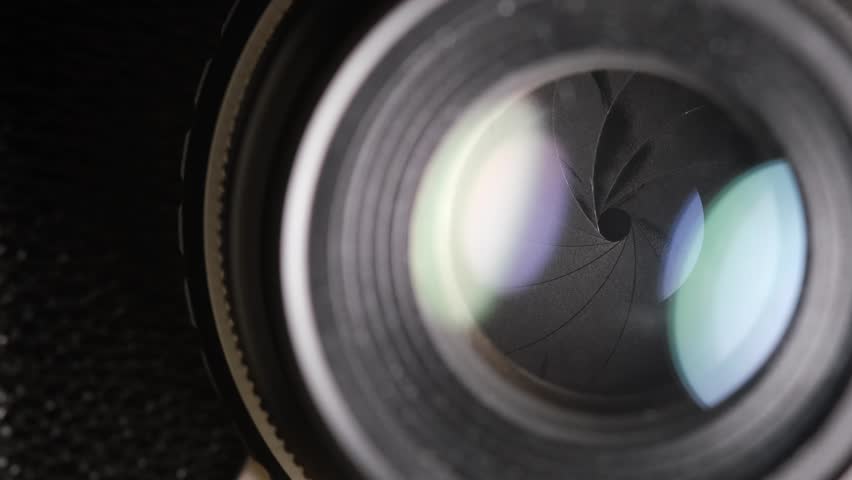 Macro Shot of Camera Lens Aperture Blades Moving, Camera lens Optics Detail.