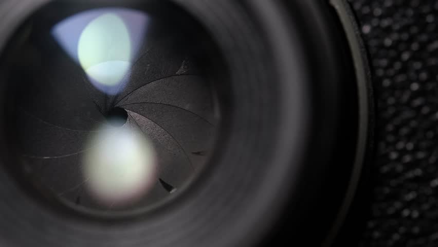 Close Up of Camera Lens Aperture Opening and Closing, Optical Technology Concept.