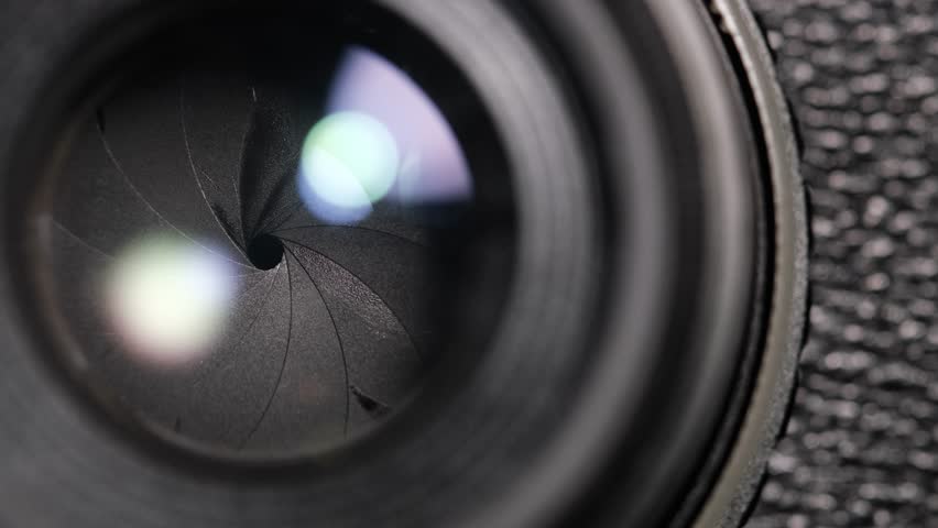Close Up Camera Lens Aperture Opening and Closing, Optical Mechanism in Action.