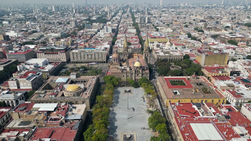 Guadalajara, Mexico - November 8 2025: Drone view of Guadalajara Cathedral, an iconic Mexican landmark. Features central Tapatia Square and surrounding urban cityscape