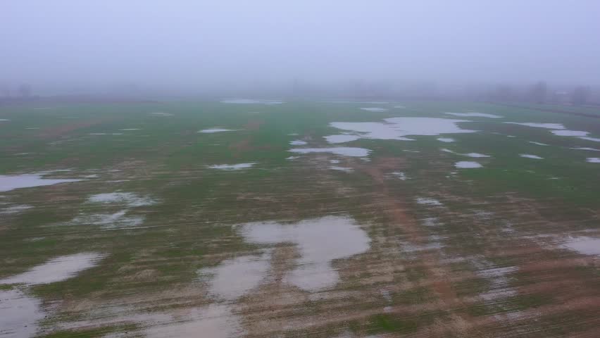 Flooded fields after heavy rain and snow