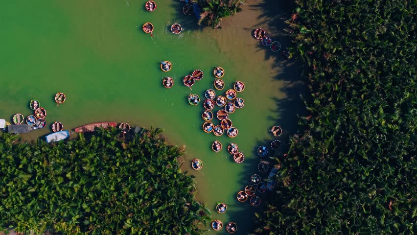 Aerial view Traditional bamboo basket boats on thu bon river, Hoi An, Vietnam.