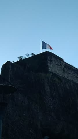 The national flag of France is a tricolour featuring three vertical bands coloured blue (hoist side), white, and red
