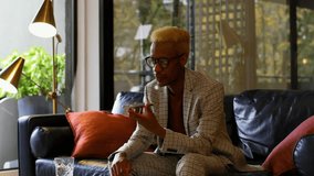 Animation of network of connections over african american businessman talking on smartphone. global business, connections and digital interface concept digitally generated video. - Powered by Shutterstock - Get 15% off with code: PIKWIZARD15