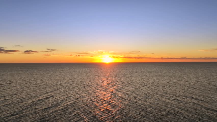 Drone Flying Over Calm Sea Water Surface At sunset, Mexico, Baja California