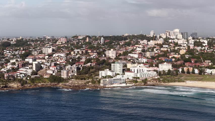 Isbergs mid aerial panorama of Bondi Beach Eastern Suburbs of Sydney coast line.
