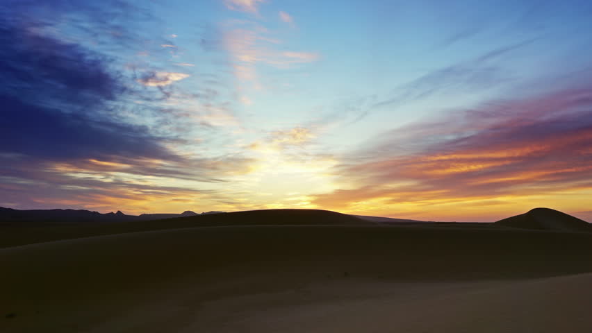 Beatiful landscape in Sahara desert at sunrise, zoom out timelapse 4k