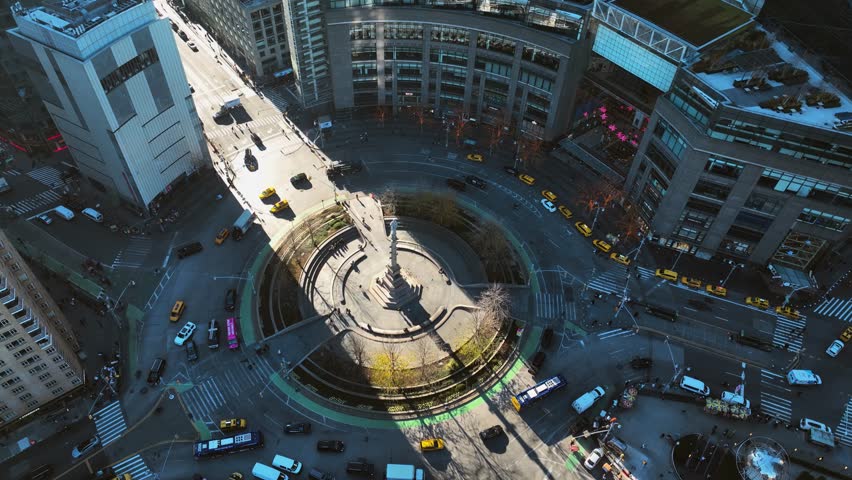 Aerial view tilting away from the Columbus Circle in MIdtown, NYC, sunny, fall day