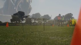 Animation of financial data and graphs over diverse male soccer players during outdoor training. Sport, training, soccer, finance and economy concept digitally generated video. - Powered by Shutterstock - Get 15% off with code: PIKWIZARD15